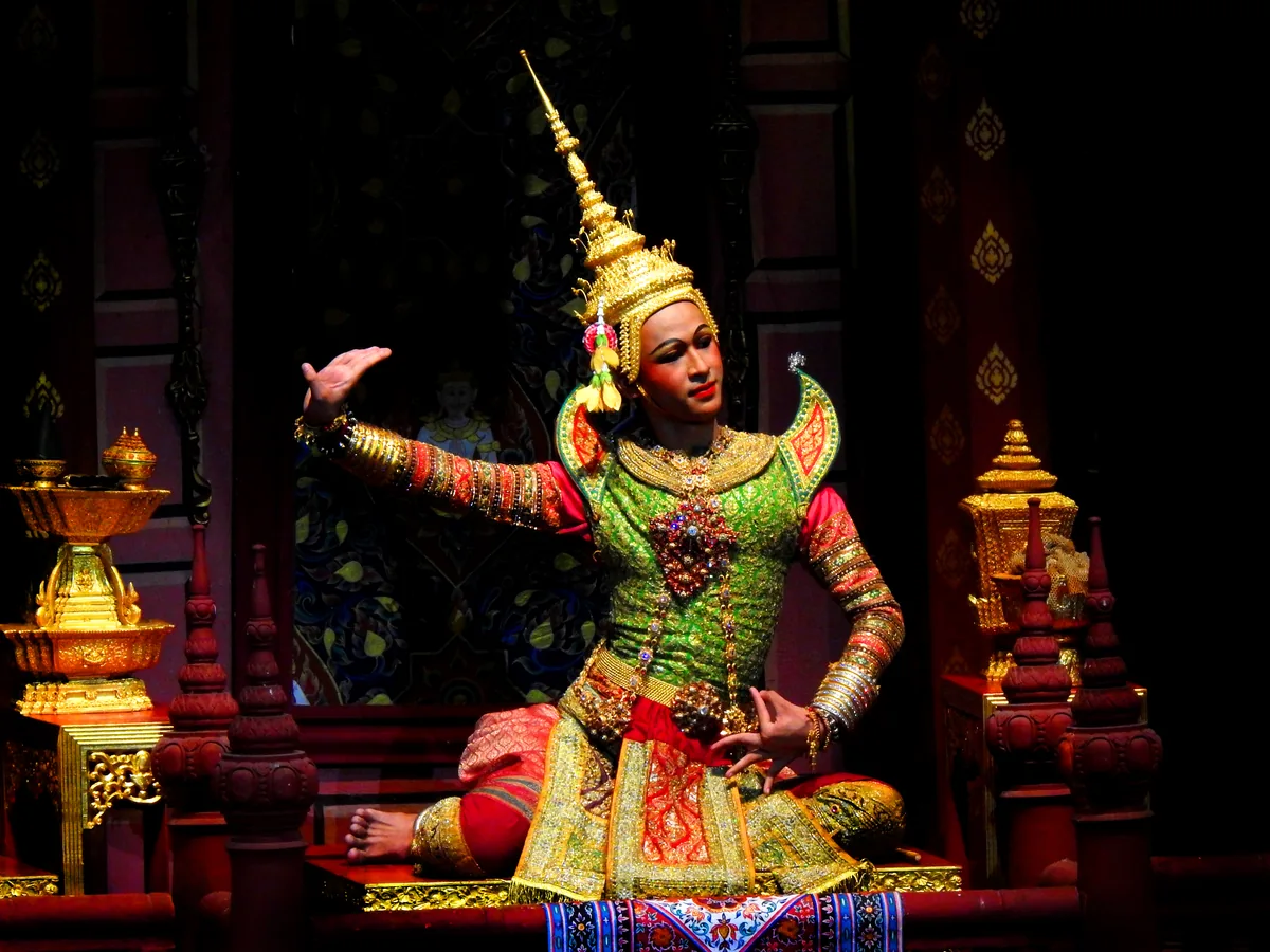 Khon performers in elaborate traditional Thai costume and masks on stage